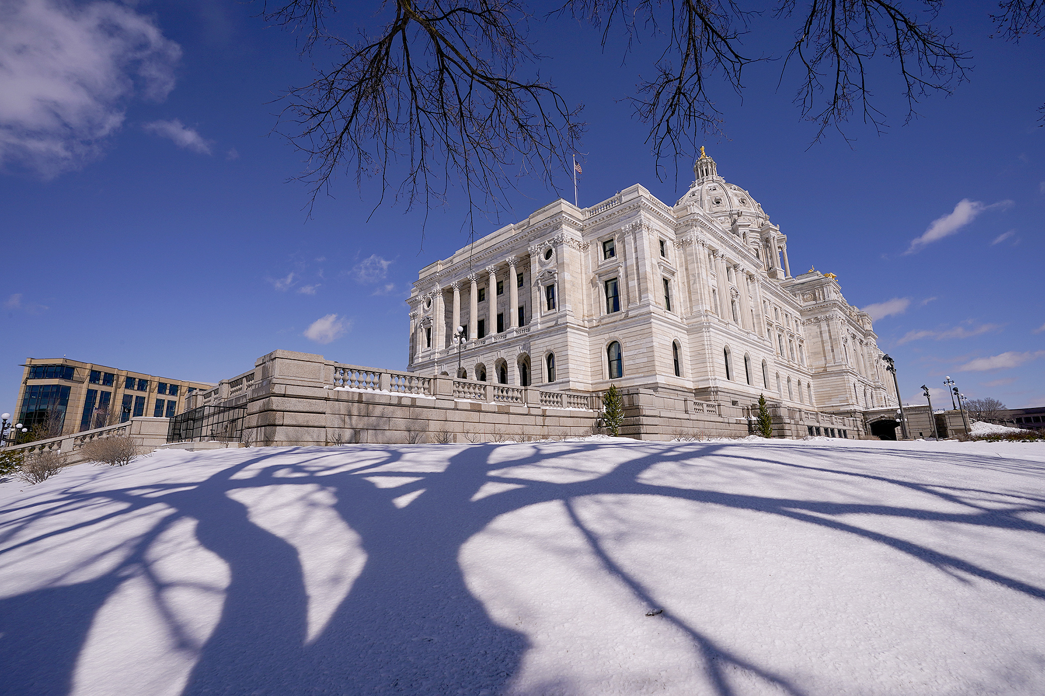 Bright sunshine casts shadows upon freshly fallen snow March 27 following an early spring storm. (Photo by Michele Jokinen)